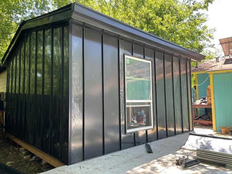 Black standing seam metal wall panels for Roof Inspection in Valley