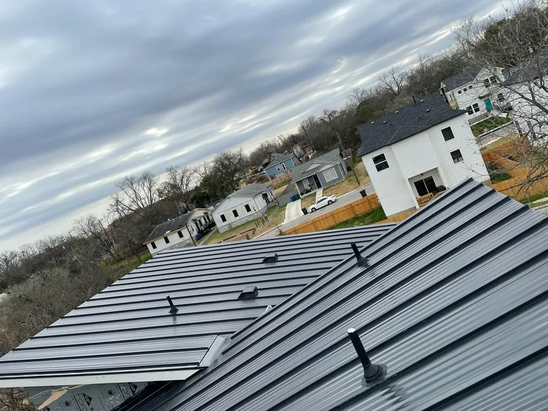 Standing seam metal roof panels with vents for Skylight Repair in Valley